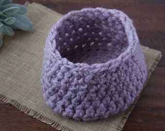 Easy to use light plum alpaca crochet baby cocoon newborn photo prop basket. Use as a soft textured wrap with wrapped or unwrapped babies.