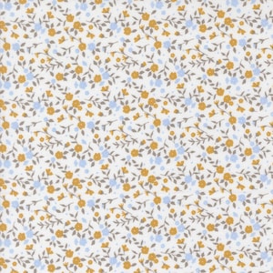 May include: White fabric with a repeating floral pattern. The design features small yellow and light blue flowers with gray stems and leaves. The flowers are scattered across the white background.
