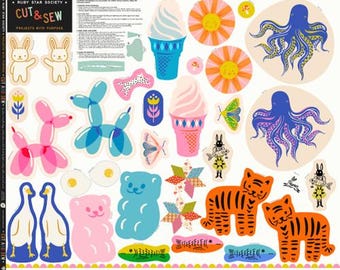 May include: A fabric panel with various cut-and-sew projects. Designs include ice cream cones, octopuses, tigers, butterflies, and balloon animals. The panel has the text "CUT & SEW" and "PROJECTS WITH PURPOSE".