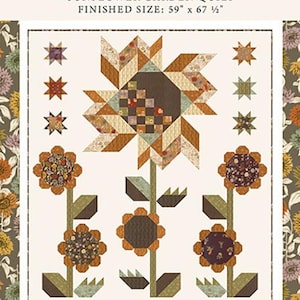 May include: A quilt pattern titled Windfall Sunflower Garden Quilt with a finished size of 59 inches by 67.5 inches. The design features a large central sunflower, smaller sunflowers, and star motifs in shades of brown, orange, and green.