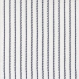 May include: White fabric with vertical blue stripes. The stripes are evenly spaced and run the length of the fabric. The fabric has a slightly textured appearance, with the blue stripes appearing to be stitched.