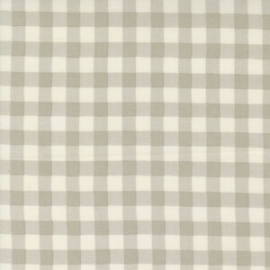 May include: A white and gray gingham fabric with a subtle texture. The fabric has a checkered pattern with alternating white and gray squares.