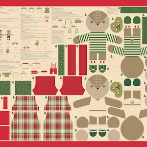 May include: A fabric panel with a Christmas theme, featuring cut-out shapes for making stuffed animals. The design includes a deer and a bull, along with instructions and fabric patterns in red, green, and beige.