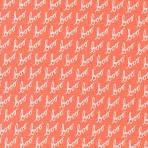 May include: A coral orange fabric with a white repeating pattern of the word "boo" written in a cursive font.