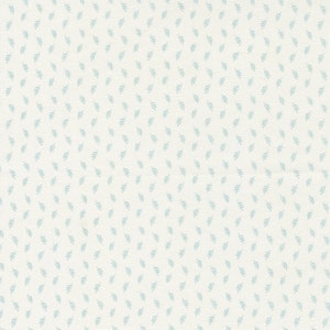 May include: A white fabric with a repeating pattern of small, light blue sprigs.