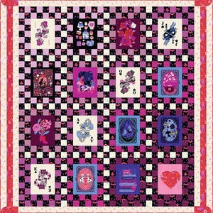 May include: A colorful quilt with a checkerboard pattern in black, white, and pink. The quilt features playing card designs with floral and whimsical illustrations. The border is a floral pattern in pink and red.