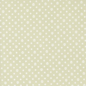May include: Light green fabric with a repeating pattern of white dots and small white house shapes. The fabric has a subtle texture and a soft, muted color palette, suitable for various craft projects.