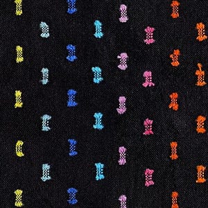May include: Close-up of a black fabric with a repeating pattern of small, colorful, embroidered shapes. The shapes are in yellow, blue, light blue, pink, and orange, creating a textured surface.