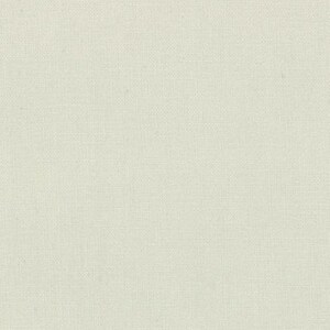 May include: A close-up of a cream-colored fabric with a subtle woven texture. The material has a slightly off-white hue, and the weave creates a grid-like pattern across the surface. The fabric appears to be a natural fiber.