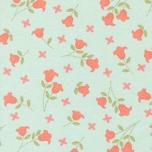 May include: A light blue fabric with a repeating pattern of coral-colored bell-shaped flowers and small pink cross-shaped accents. The flowers have green stems and leaves, and are outlined with a dashed stitch.