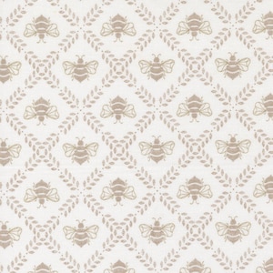 May include: A repeating pattern of tan bees and leafy sprigs on a white background. The bees are evenly spaced within a diamond grid, with the sprigs forming the diamond outlines. The design is simple and elegant, suitable for fabric or wallpaper.