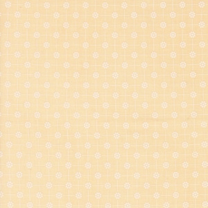 May include: A pale yellow fabric with a white repeating pattern of small flowers. The fabric has a subtle grid pattern.