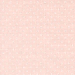 May include: A pink fabric with a white floral pattern. The pattern is a repeating design of small white flowers.