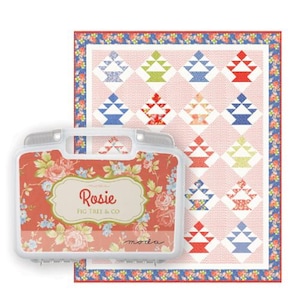 May include: A sewing kit and quilt featuring a basket design. The sewing kit has a floral pattern with the name "Rosie" on it. The quilt has a red background with basket designs in various colors.
