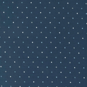 May include: A dark blue fabric with a white polka dot pattern. The dots are evenly spaced and create a subtle, elegant design.