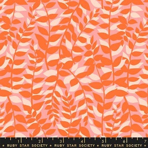 May include: A pink and orange fabric with a repeating pattern of stylized leaves. The leaves are a solid orange color with white outlines. The background is a light pink color.