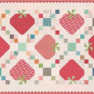 May include: A rectangular quilt featuring a repeating pattern of red strawberries with green stems and leaves. The strawberries are set against a cream background with colorful square accents and a scalloped pink border. The quilt is a patchwork design.
