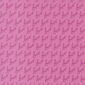 May include: A pink fabric with a repeating pattern of the word "boo" written in a cursive font.
