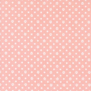 May include: A pink fabric with a white polka dot and house pattern.