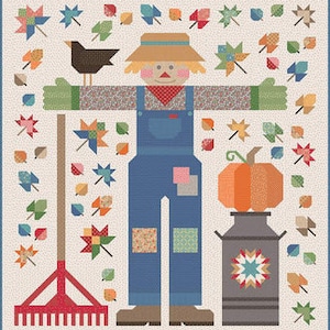 May include: A patchwork quilt featuring a scarecrow with a straw hat, overalls, and a pumpkin. The scarecrow is surrounded by colorful leaves and a rake.