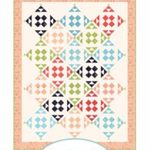 May include: Pink Lemonade quilt pattern by a Quilting Life Designs. The pattern features a colorful geometric design with a starburst pattern in the center. The quilt is made up of various colors, including pink, red, blue, green, and black.