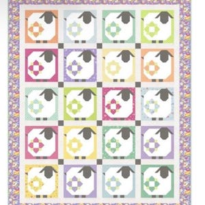 May include: A colorful quilt featuring a repeating pattern of sheep. Each sheep is set within a square of a different pastel color, with a floral design in the center. The quilt has a patterned border.