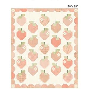 May include: A quilt pattern featuring a design of pink strawberries with green leaves and white flowers on a white background. The pattern is called "Sweet Strawberry" and is part of the "Dainty Meadow Fabric Collection". The pattern is 78 inches by 93 inches.