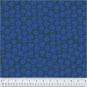 May include: A dark blue fabric with a repeating pattern of blue flowers. The flowers are stylized and have a simple design.