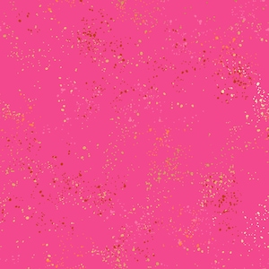 May include: A vibrant pink fabric with a speckled pattern. The design features a scattering of small, irregular dots in shades of gold, red, and white, creating a textured, artistic effect. The overall aesthetic is playful and modern.