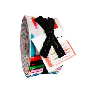 May include: Rolled fabric bundle with a colorful assortment of patterned designs. The bundle is secured with a black ribbon and includes a tag with the text "RUBY STAR SOCIETY" and "by MELODY MILLER".