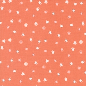 May include: A coral orange fabric with a white star pattern. The stars are evenly spaced and create a subtle, repeating pattern.