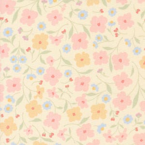 May include: A fabric with a repeating floral pattern. The design features pink, yellow, and blue flowers with green stems and leaves on a cream-colored background. The flowers are stylized and evenly spaced.
