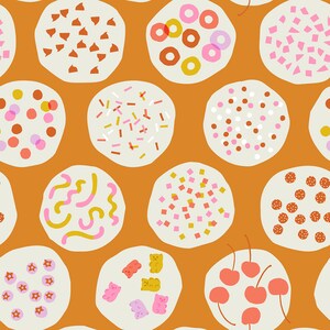May include: A seamless pattern of various decorated cookies on a brown background. The cookies are decorated with sprinkles, dots, squares, swirls, cherries, and gummy bears.