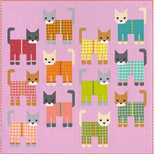 May include: A pink quilt featuring a repeating pattern of stylized cats. Each cat is composed of geometric shapes and wears a plaid coat in various colors, including red, orange, yellow, green, and blue. The quilt is likely machine-made.