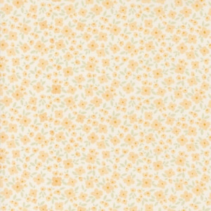 May include: A white fabric with a small, delicate floral pattern in a light orange color.