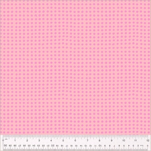 May include: Pink fabric with a repeating pattern of small, light purple polka dots. The dots are evenly spaced across the pink background. A ruler is at the bottom of the image, showing inches.