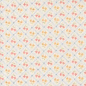 May include: A white background with a repeating pattern of small pink and yellow flowers with blue lines forming a diamond pattern.