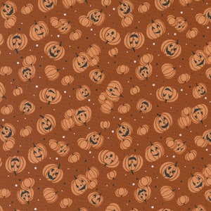 May include: A seamless pattern featuring orange pumpkins with black smiling faces on a brown background. The pumpkins are of various sizes and are scattered randomly across the surface.