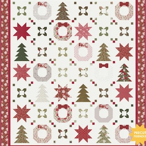 May include: A white quilt with a Christmas theme. The quilt features red and green stars, trees, wreaths, and bows. The quilt is surrounded by a red border with white flowers.