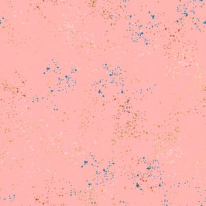 May include: A pink background with a scattered pattern of small blue, gold, and white dots.