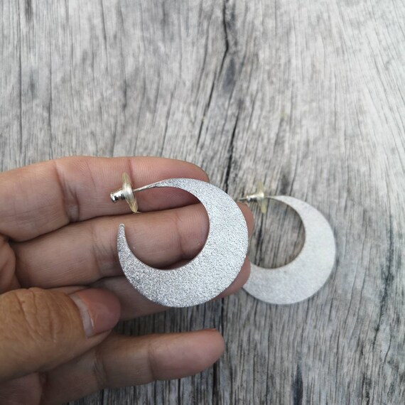 Half moon hotsell silver earrings