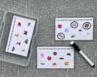May include: Educational digital download for learning beginning sounds. Includes cards with illustrations and the text "I can circle the things that start with the letter A, B, and C." A dry-erase marker is also included.