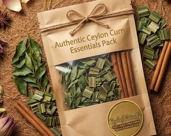 May include: A kraft paper pouch labeled "Authentic Ceylon Curry Essentials Pack" tied with twine. The pouch contains green herbs, chopped lemongrass, and cinnamon sticks. A gold sticker reads "Ceylon Naturally".