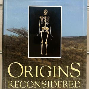 May include: Book cover featuring the title "ORIGINS RECONSIDERED" by Richard Leakey and Roger Lewin. The cover includes an image of a human skeleton and the text "In Search of What Makes Us Human."