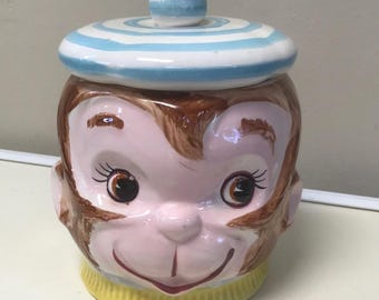 RARO pote de biscoitos vintage em formato de macaco com boina