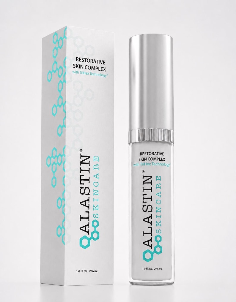 May include: A white rectangular box and a cylindrical bottle of Alastin Skincare Restorative Skin Complex with TriHex Technology. Both items feature teal molecular patterns, silver caps, and the text 1.0 Fl. Oz. 29.6 mL printed on the front.