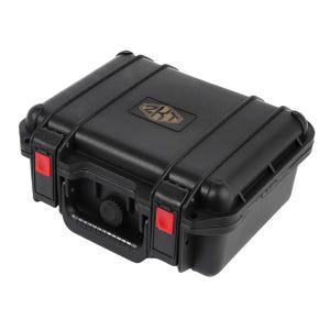 May include: A black, rectangular, hard-shell case with a handle and red accents. The case has a secure latching mechanism and a logo that reads "2KT" in gold. The case is designed to protect its contents.