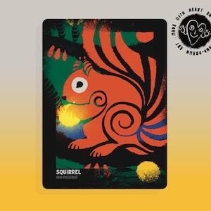 May include: A rectangular art print featuring a stylized orange squirrel with black stripes, a white eye, and a yellow object. The background is black with green and red accents. The word "SQUIRREL" is at the bottom.