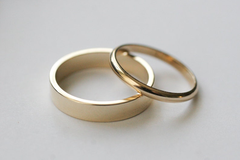 Odd couple 14k wedding bands image 2