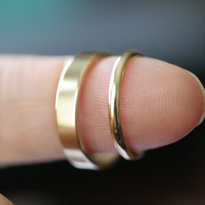 Odd couple 14k wedding bands image 4